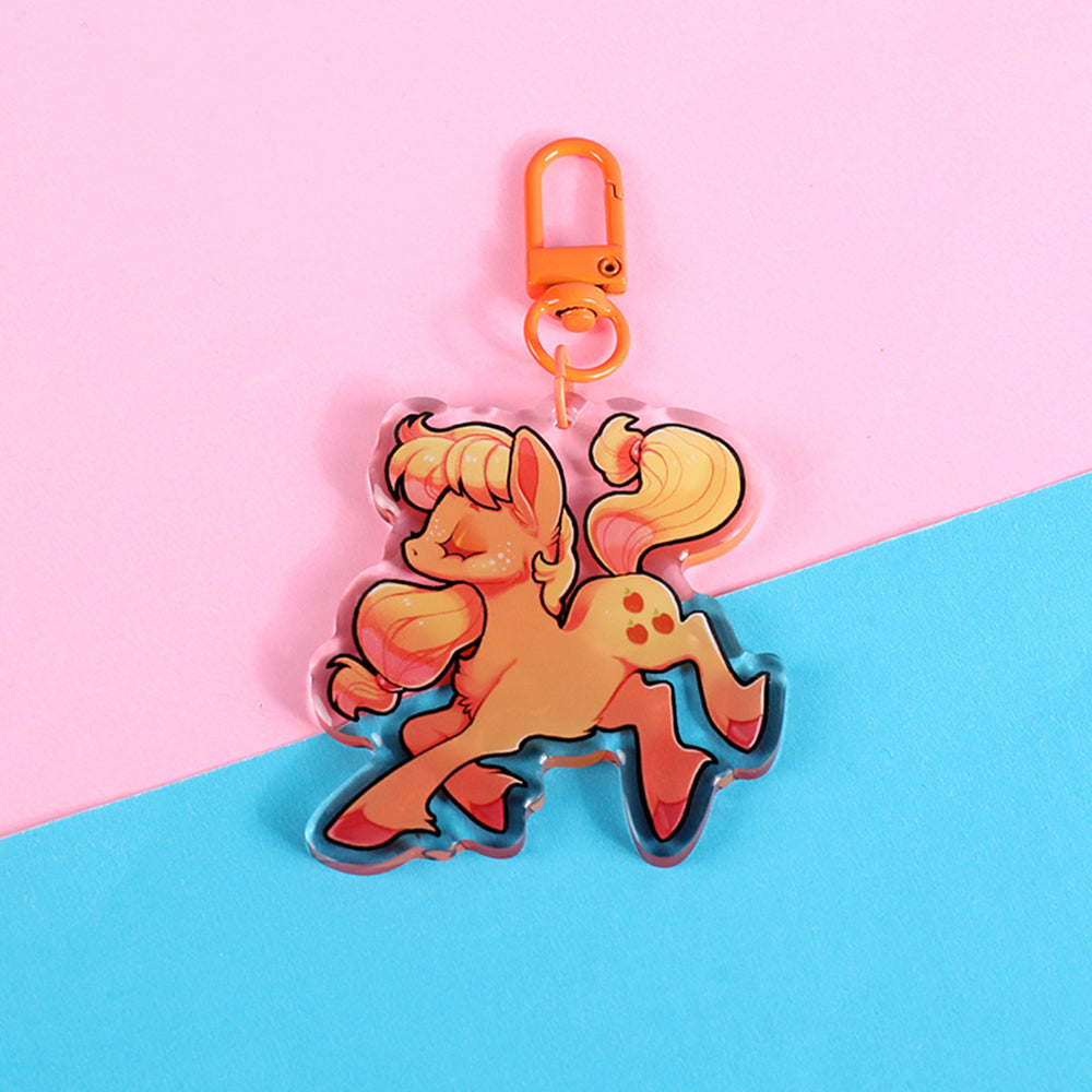Breloque poney pomme orange