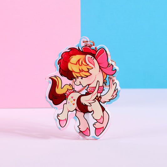 Charm de poni con flecos cantante