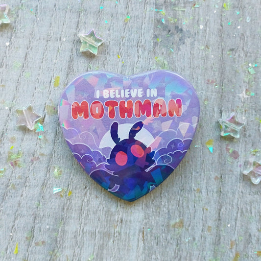 Insignia de hojalata holográfica "Creo en Mothman"