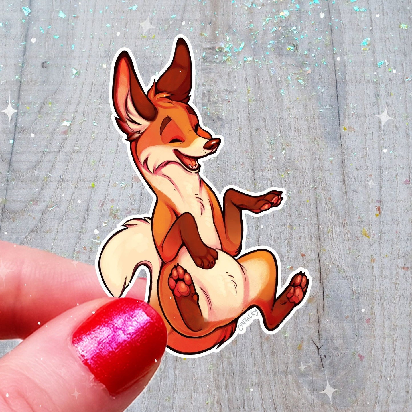 Pegatina de vinilo con un zorro gracioso y simpático