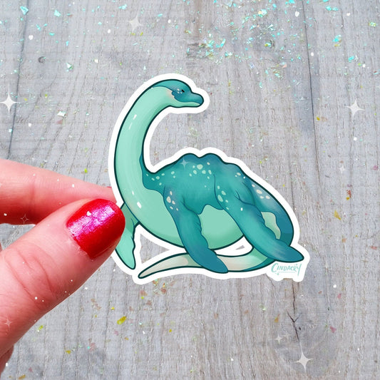 Pegatina holográfica de Nessie, adorable, kawaii, holográfica, arcoíris, críptica, monstruo del lago Ness