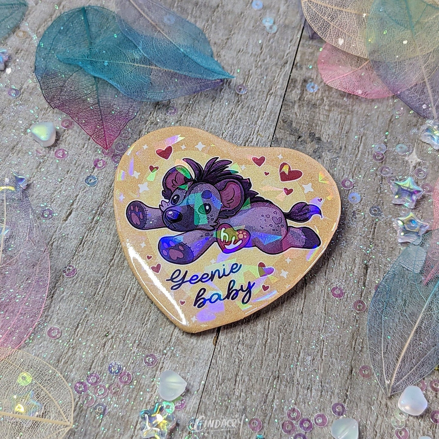 Insignia de hojalata holográfica peluda de la cría de hiena Yeenie